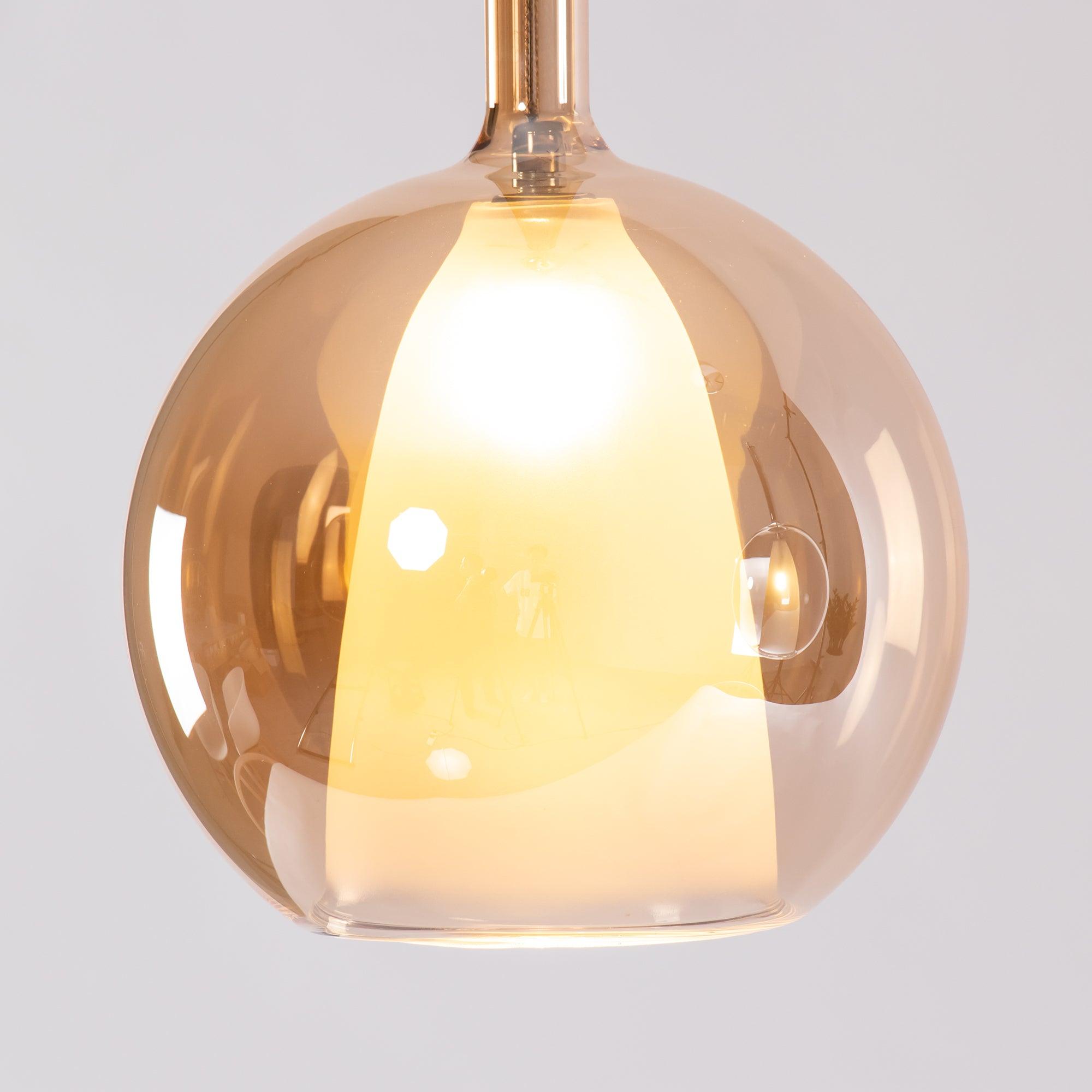 Énora | Suspension Glo – Design Iconique et Ambiance Envoûtante